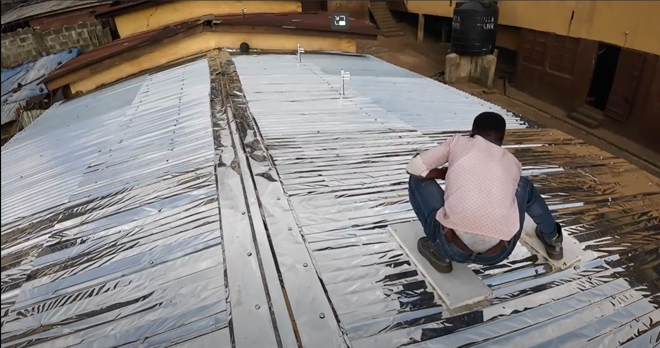 Local installer at work on the roof
