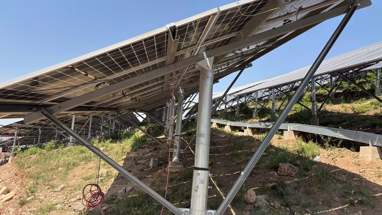 Underside of a reflective panel array on a hillside in China